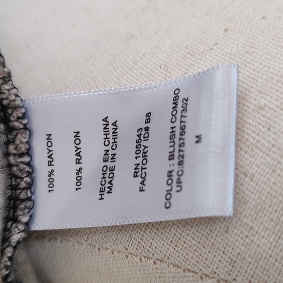 Daisy Fuentes wrap style stretchy top and black and cream, medium - Picture 6 of 6